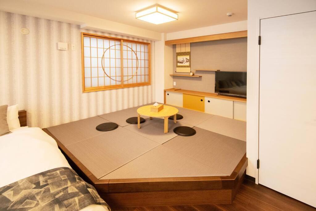 Apartamento 浅草禅心居301室 浅草駅徒歩15分 2024年4月ニューオープン 43平米丸貸し切り ダブルベット2台と畳敷き布団2組 家庭式用品設備完備 Tóquio